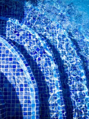 Blue tiled stairs in a swimming pool